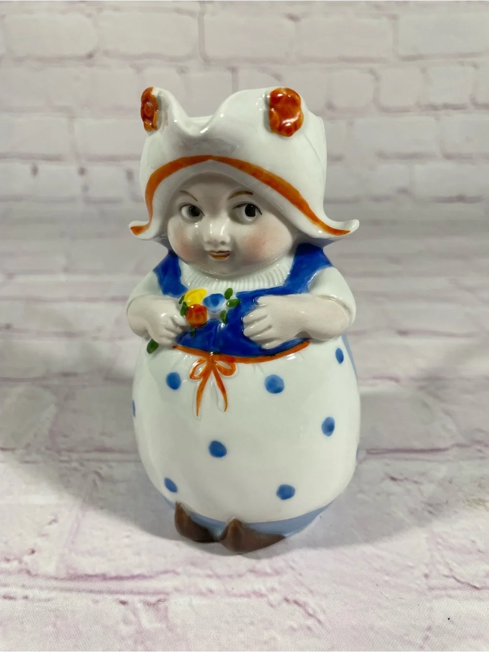 Vintage Dutch Girl Holding Flowers Hand Painted Ceramic Creamer Pitcher Germany
